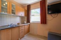 Kuchyňa alebo kuchynka v ubytovaní Apartmani Malbašić