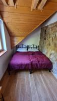 Postel nebo postele na pokoji v ubytování Penzion Srub Panorama