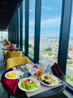 a table with two plates of food on it at Mia Apec Mandala Phú Yên in Tuy Hoa