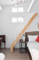 Seochon Secret Cave Houseにあるベッド