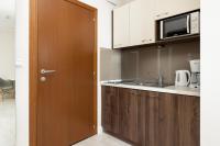 Kuchnia lub aneks kuchenny w obiekcie Apartamenty Aquamarina by Noclegi Renters