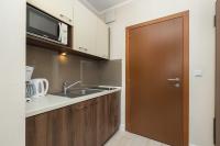 Kuchnia lub aneks kuchenny w obiekcie Apartamenty Aquamarina by Noclegi Renters