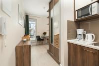 Kuchnia lub aneks kuchenny w obiekcie Apartamenty Aquamarina by Noclegi Renters