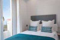 Posteľ alebo postele v izbe v ubytovaní Living4malaga Blue Bay