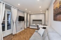 A television and/or entertainment centre at MagnoliaApartments - 5 Nirone Center
