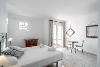Posteľ alebo postele v izbe v ubytovaní Via Romana 87 Villas Casasol