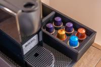 a bunch of cupcakes are in a coffee machine at Santa Monica Hotel in Los Angeles