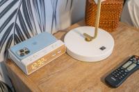 a nintendo wii game system on a table with a remote control at Santa Monica Hotel in Los Angeles