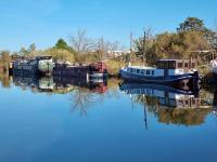 a group of boats are docked in the water at PÉNICHE authentique tout confort in Aigues-Mortes