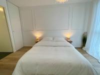 Una cama o camas en una habitaci&oacute;n de New Cosy House Paris*CDG*Ast&eacute;rix