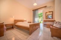 A bed or beds in a room at Natasa Studios
