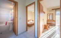 A bed or beds in a room at Natasa Studios