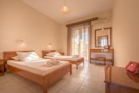 A bed or beds in a room at Natasa Studios