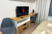 TV a/nebo společenská místnost v ubytování Residence My Mozart