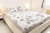 Een bed of bedden in een kamer bij Maris