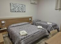 A bed or beds in a room at Villa Magiola Pompei