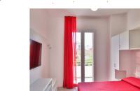 Łóżko lub łóżka w pokoju w obiekcie Ciccio Hotel