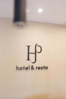 サン・ペドロにあるSan Pedro Hotel & Restóのホテルとレシエスタの看板