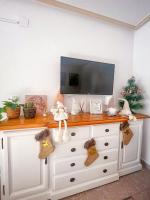 TV a/nebo společenská místnost v ubytování Apartament Blanca