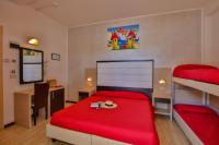 Łóżko lub łóżka w pokoju w obiekcie Ciccio Hotel