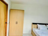 Postel nebo postele na pokoji v ubytování La Villas@Suanphueng