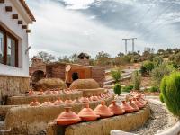 Room in Bungalow - Triple Bungalow 6 - El Cortijo Chefchaeun Hotel Spaにある庭