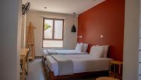 Viajero Huacachina Hostelにあるベッド