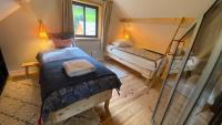 Posteľ alebo postele v izbe v ubytovaní Le Chalet de Castille - chalet pyrénéen grand confort - spa