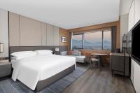 Sheraton Pujiangにあるテレビまたはエンターテインメントセンター
