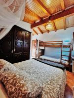 A bed or beds in a room at Apartaments Cel i Fusta