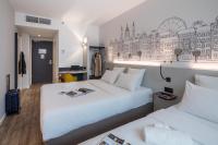 B&B Hotel Budapest Cityにあるベッド