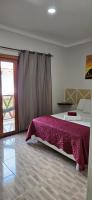 Cama ou camas em um quarto em Pousada e Restaurante Paraíso Natural