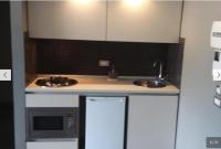 A kitchen or kitchenette at Uniclub House