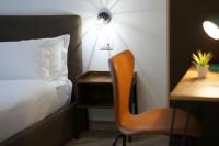 A bed or beds in a room at The Roman Way San Giovanni
