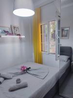Posteľ alebo postele v izbe v ubytovaní KASTRO HOUSE