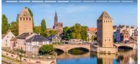 a view of a city with a bridge and a river at MOBIL HOME Clim BOOFZHEIM 6 PERSONNES 3 CHAMBRES LE RIED 3 ETOILES PROCHE EUROPA PARK in Boofzheim