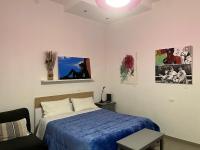 Posteľ alebo postele v izbe v ubytovaní Casa Cirenaica Art House