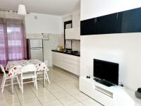 Kuchyňa alebo kuchynka v ubytovaní White Apartment