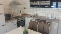 Kuchyňa alebo kuchynka v ubytovaní Apartments ITD
