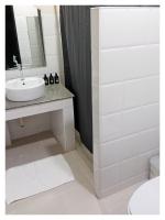 Ein Badezimmer in der Unterkunft Ampha Place Hotel