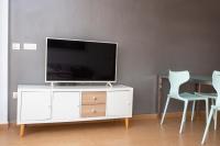 Televízia a/alebo spoločenská miestnosť v ubytovaní 4-Seasons Penthouse Cullera