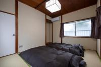 こんぴら町家 Konpira Machiyaにあるベッド