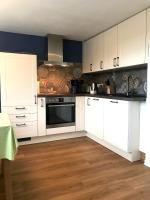 Kuchyň nebo kuchyňský kout v ubytování Ruhige Ferienwohnung mit Sonnenterrasse und Garten