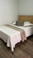Hotel Chão Mineiroにあるベッド