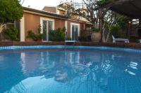 The swimming pool at or close to Star Jasmine House Acharavi