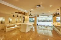 a large room with a dressing room with mirrors at Hotel Crowne Imperial in Kathmandu