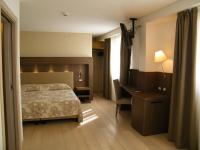 Posteľ alebo postele v izbe v ubytovaní Grand Hotel Miramonti