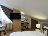 TV a/nebo společenská místnost v ubytování Sana Ski apartment 702 in Flora, Borovets