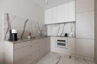 Kuchnia lub aneks kuchenny w obiekcie LET'S SEA - 4 Person - Premium Baltic Apartment with Sea View nad SPA access
