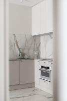Kuchnia lub aneks kuchenny w obiekcie LET'S SEA - 4 Person - Premium Baltic Apartment with Sea View nad SPA access